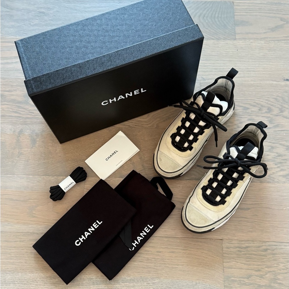 Women’s Chanel fabric & suede calfskin sneaker. Size 36.5. White & black.